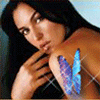 Аватар Голубая бабочка на плече темноволосой девушки