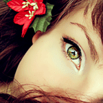 Аватар Девушка с цветком в волосах