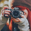 Аватар рыжая девушка с фотоаппаратом