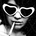 99px.ru аватар девушка в очках-сердечках курит