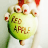 Аватар Девушка держит зелёное яблоко с надписью Red Apple