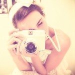 Аватар Девушка с фотоаппаратом в руках