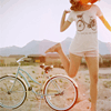 99px.ru аватар Девушка прыгает рядом с велосипедом