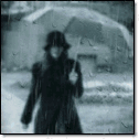 99px.ru аватар Девушка в чёрном идёт по дождливому городу