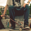 99px.ru аватар Парень сидит со скейтом