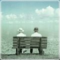 99px.ru аватар Мужчина и женщина сидят на скамейке и смотрят в море