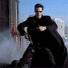 Аватар Нео стреляет в мистера Смита, кадр из фильма Матрица / Matrix