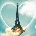 99px.ru аватар Макет Эйфелевой башни / The Eiffel Tower на человеческой руке на фоне белого сердечка и неба с белыми облаками