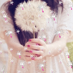 99px.ru аватар Девушка брюнетка держит в руках белый одуванчик с которого летят семена
