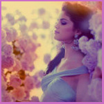 99px.ru аватар Актриса и певица Selena Gomez / Селена Гомес на фоне розовых и фиолетовых цветов