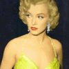 Аватар Marilyn Monroe / Мэрилин Монро в светло-зеленом платье и сверкающих сережках смотрит куда-то в сторону