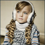 Аватар Модель Кристина Пименова / Kristina Pimenova в меховых наушниках, свитерке, с заплетенными двумя косичками