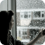 Аватар Девушка смотрит на окно, за которым падает снег