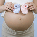 99px.ru аватар Разноцветные пинетки на животе у беременной девушки