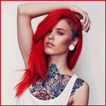 Аватар Девушка с красными волосами и тату на груди, закинула руку на голову