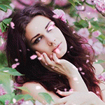 99px.ru аватар Девушка на фоне розовых цветов с летящими лепестками