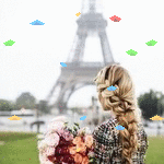 99px.ru аватар Девушка с букетом цветов, на фоне Эйфелевой башни, вокруг летают разноцветные конфетти