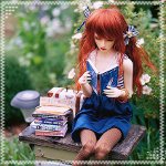 Аватар Кукла бжд сидит на скамейке в саду с раскрытой книгой в руках
