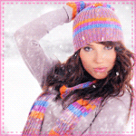 Аватар Девушка в розовой вязаной шапке под снегопадом