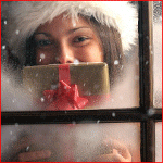 99px.ru аватар Девушка с новогодним подарком в руках смотрит в окно, за которым идет снег