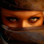 Аватар Девушка с зелеными глазами и шалью, закрывающей лицо