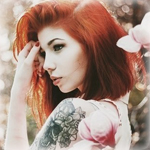 99px.ru аватар Рыжеволосая девушка с татуировкой на плече