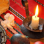 99px.ru аватар Горящая свеча на подставке возле крашеных яиц