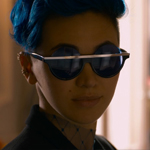99px.ru аватар Девушка короткостриженная с синими волосами и большими круглыми очками на оранжевом фоне Bugs из фильма Матрица Воскрешение