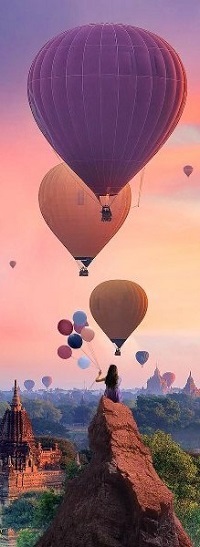 99px.ru аватар Девушка с воздушными шарами сидит на вершине скалы, by Robert Jahns