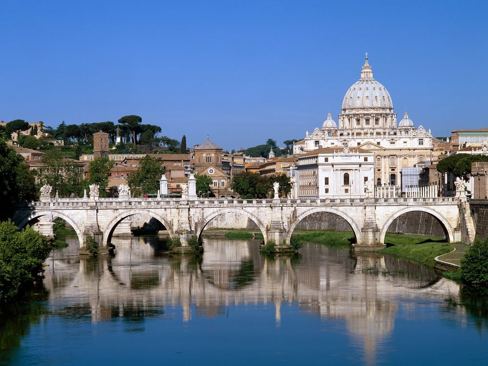 Обои для рабочего стола The Vatican Seen Past the Tiber River, Rome, Italy