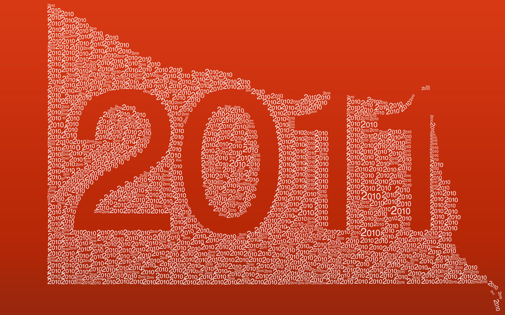 Обои для рабочего стола На красном фоне надпись 2011 обведена цифрами 2010