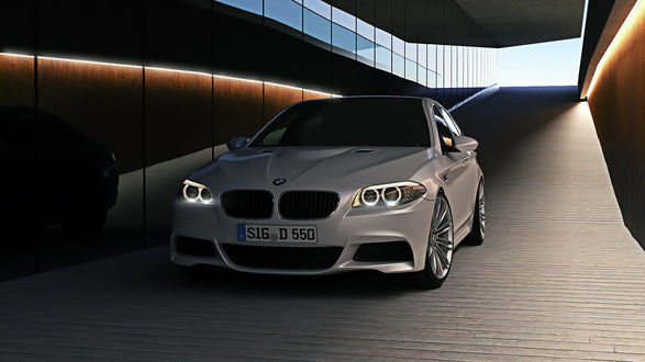 Обои на рабочий стол BMW m5 заезжает в подземный гараж (SIG D 550)