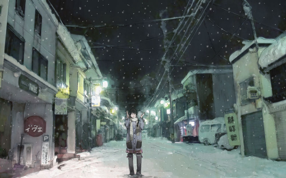 Обои для рабочего стола Девушка зимой в снегопад стоит на улице ночного города