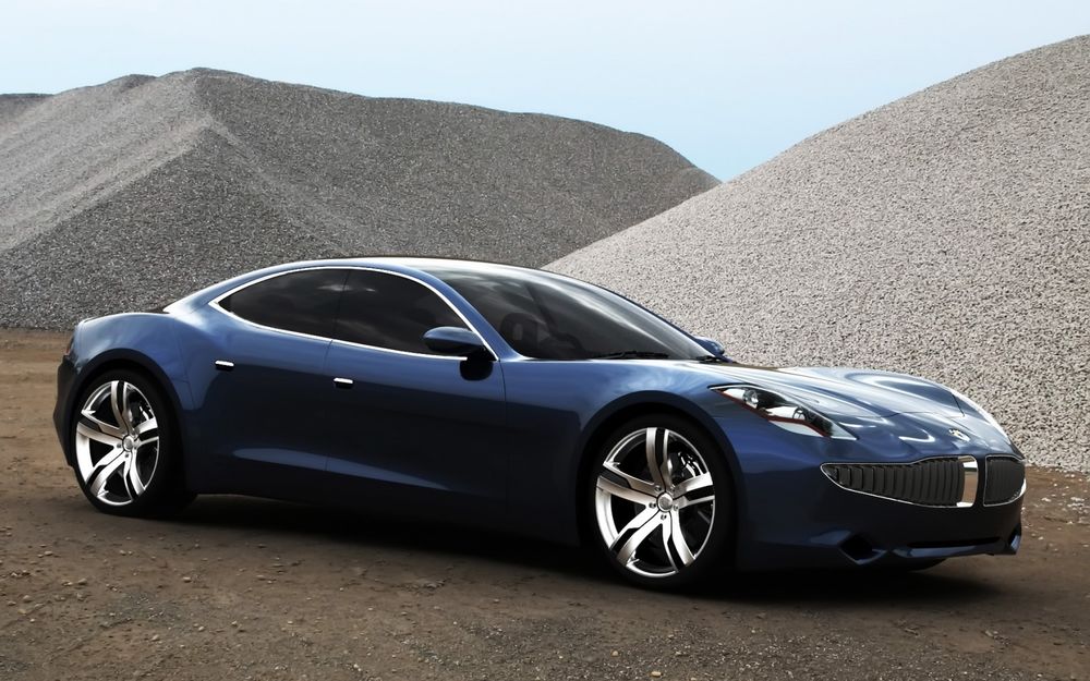 Обои для рабочего стола Fisker Four Door Concept на дороге, вокруг горы щебня
