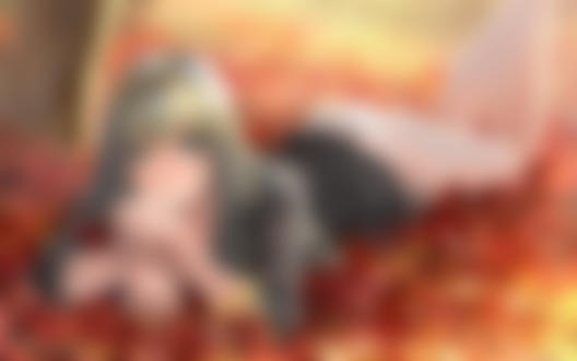 Обои для рабочего стола Красивая девушка лежит на опавшей осенней листве