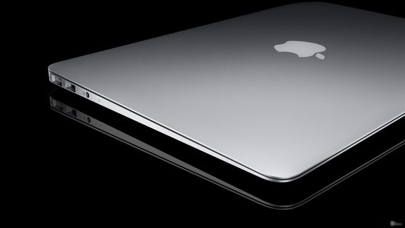 Обои на рабочий стол Серебристый планшет фирмы Apple