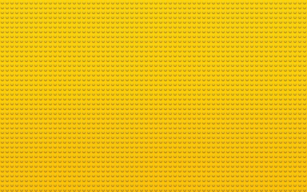 Обои для рабочего стола Большая желтая деталь конструктора Лего / LEGO