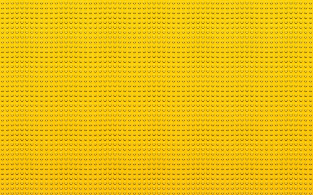 Обои для рабочего стола Большая желтая деталь конструктора Лего / LEGO