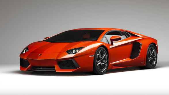 Обои на рабочий стол Оранжевый Lamborghini / Ламборджини Aventador