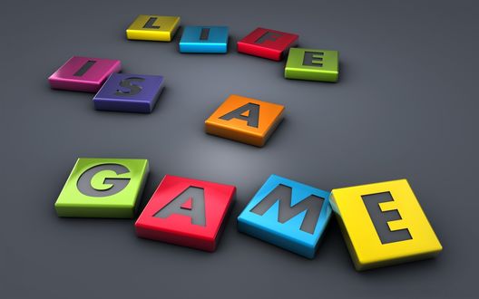 Обои на рабочий стол Из разноцветных кубиков сложена фраза 'Life is a game' ( Жизнь - это игра )
