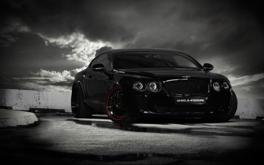 Обои на рабочий стол Черный Bentley Continental Ultrasports 702 на фоне облаков (Wheels and more)