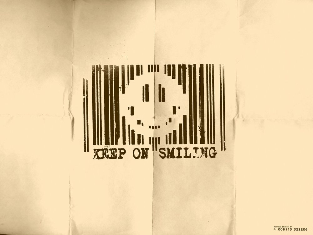 Обои для рабочего стола Штрихкод со смайлом на мятой бумаге (Keep on smiling / Продолжайте улыбаться)
