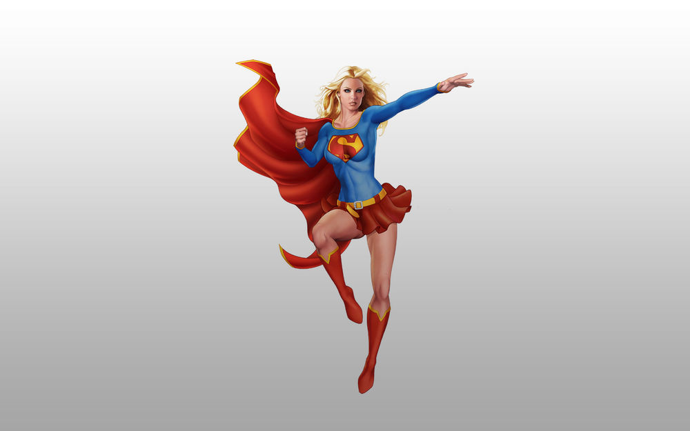 Обои для рабочего стола Супердевушка / Supergirl указывает рукой вдаль паря в воздухе