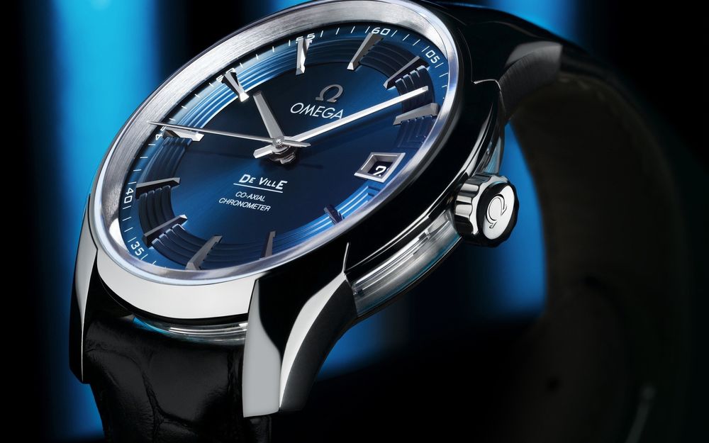 Обои для рабочего стола Мужские наручные часы знаменитой швейцарской фирмы Omega / Омега
