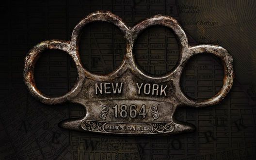 Обои на рабочий стол Старинный кастет, на котором написано NEW YORK 1864 METROPOLITAN POLICE