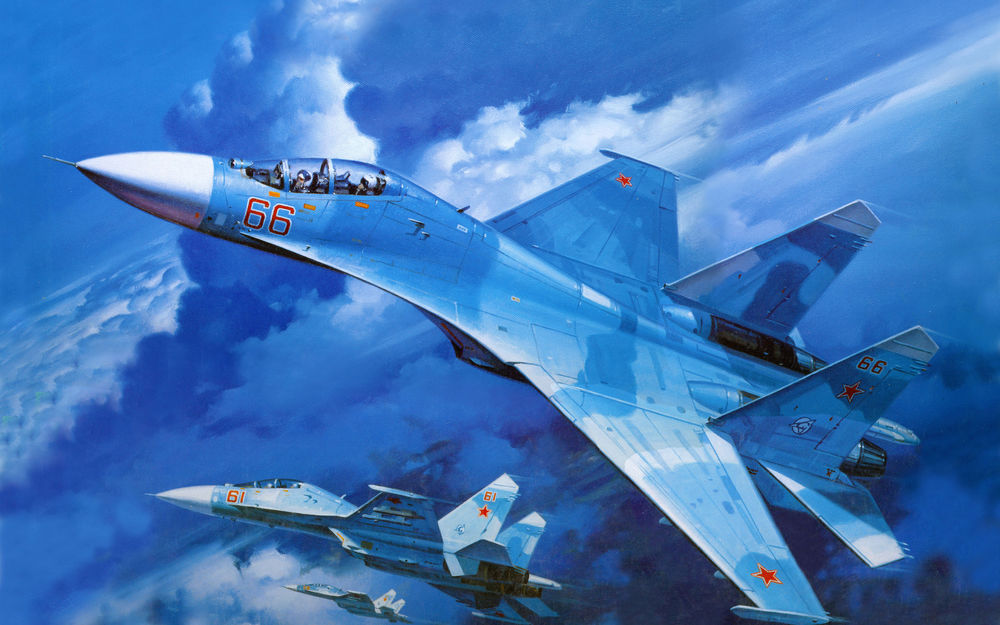 Обои для рабочего стола В небе пара истребителей-перехватчиков Су-27, состоящих на вооружении ВВС России