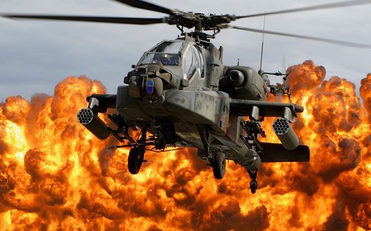 Обои на рабочий стол Американский вертолет АН-64 'Апач / Apache' на фоне огненной вспышки