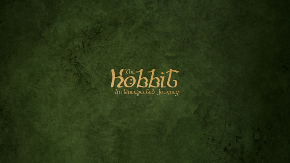 Обои на рабочий стол Надпись The Hobbit: An Unexpected Journey / Хоббит: Нежданное путешествие на зеленом фоне