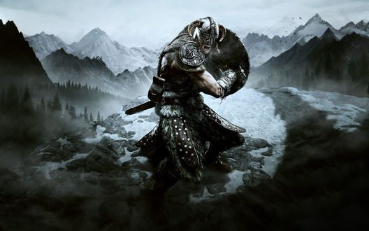 Обои на рабочий стол Воин на вершине горы с мечом из игры The Elder Scrolls V: Skyrim / Древние свитки 5: Небесный край