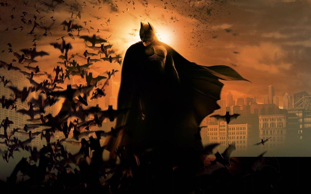 Обои для рабочего стола Бэтмен / Batman, персонаж фильма Темный рыцарь / The Dark Knight окруженный летучими мышами